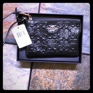BRAND NEW with tags Coach wristlet!